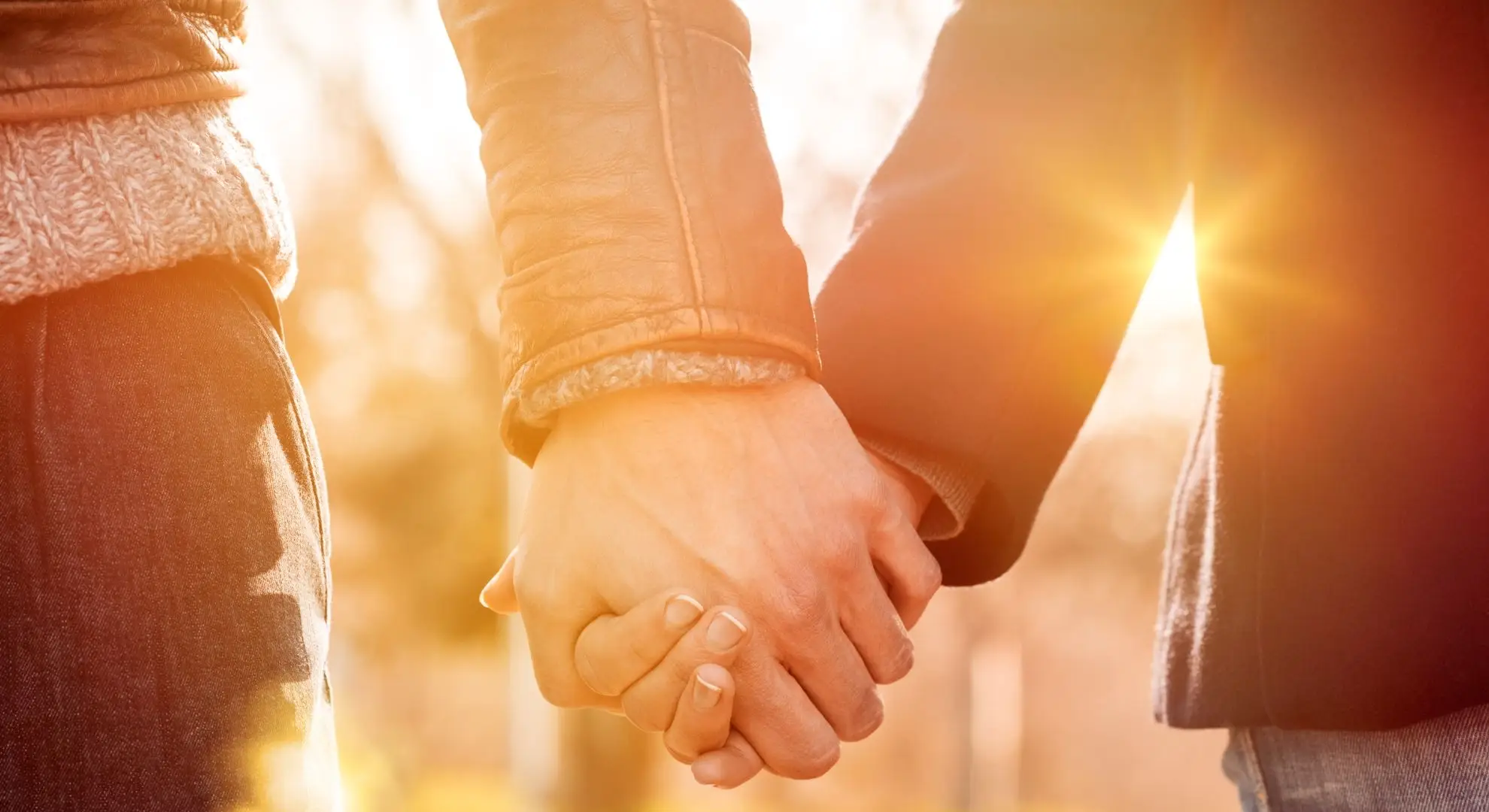 two people holding hands