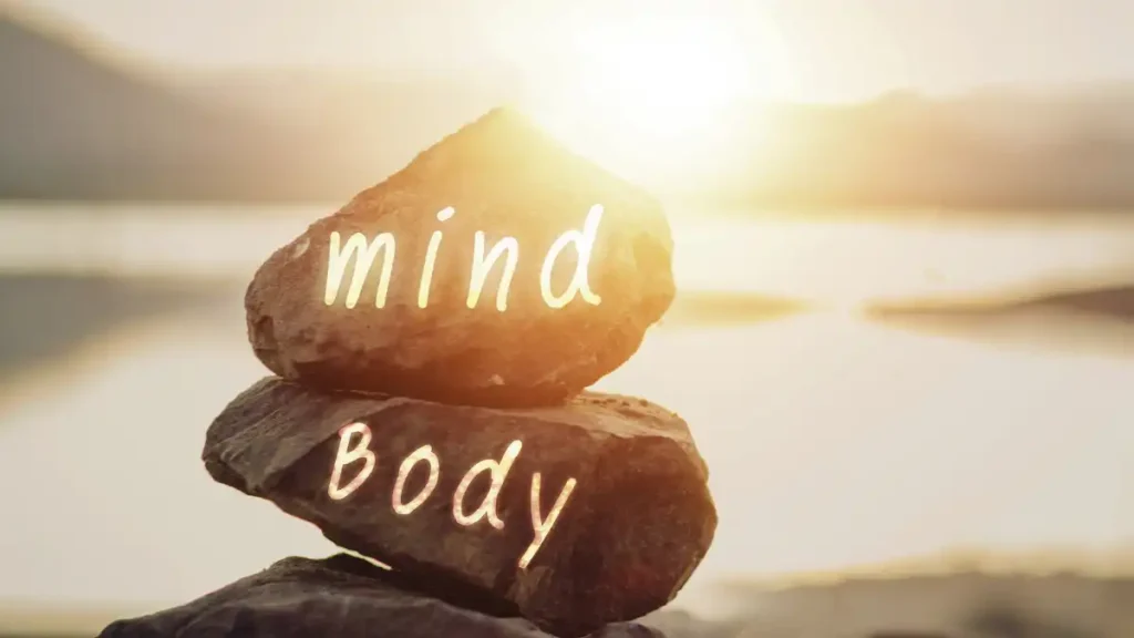 Stones balancing with "mind" and "body" written on them