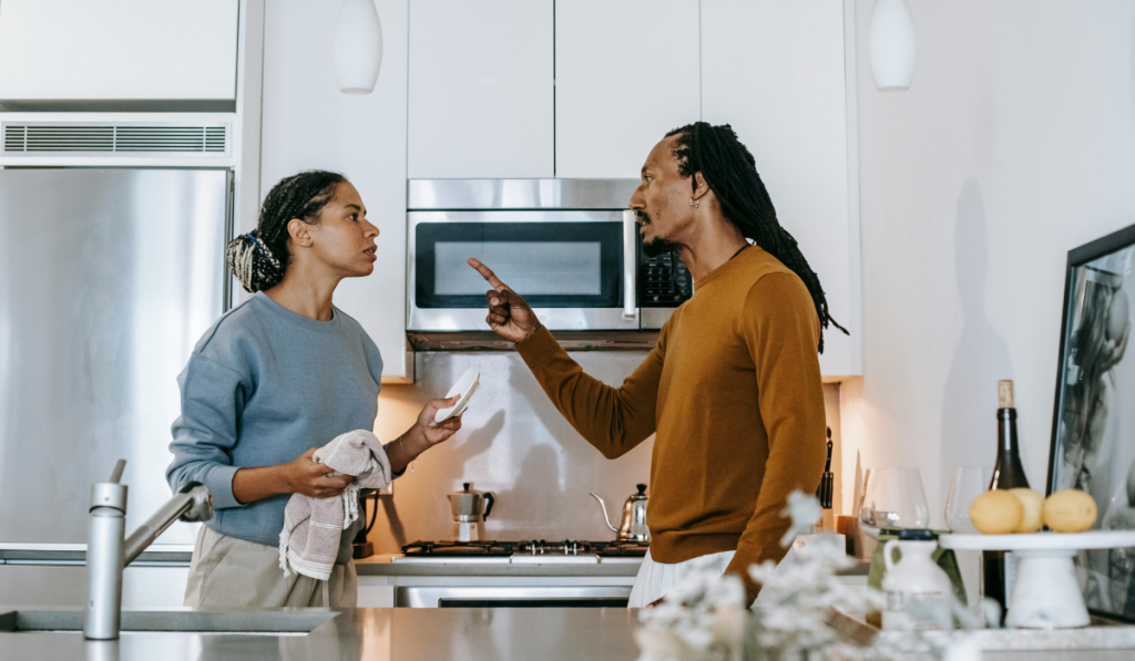 couple arguing in the kitchen